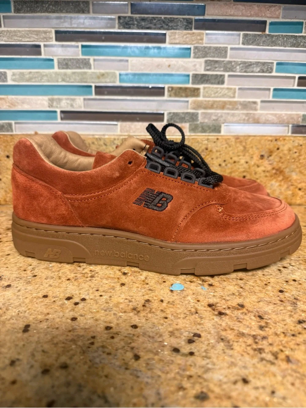 New Balance unisex Suede Sneaker in Rust Orange with Gum Sole